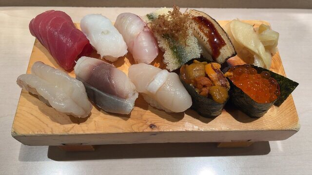 sushi arranged in wooden plate