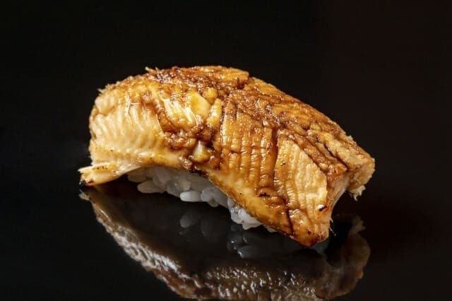 Anago zushi in black background