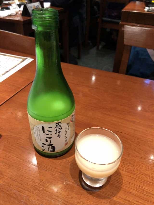 nigori sake bottle and cup