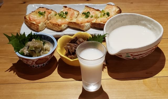 Nigori Sake served with food
