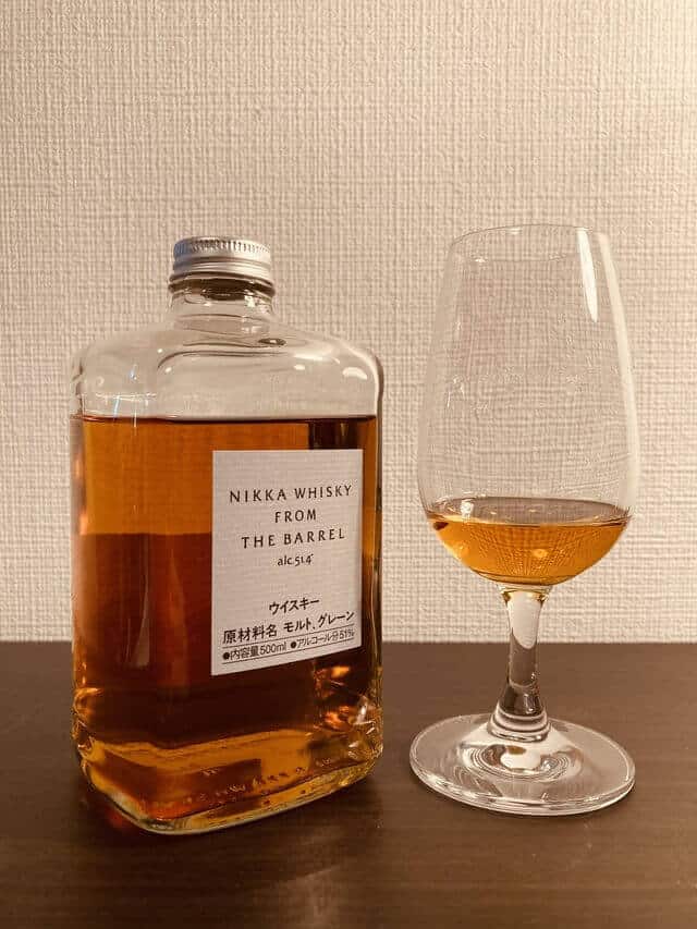from the barrel with wine glass