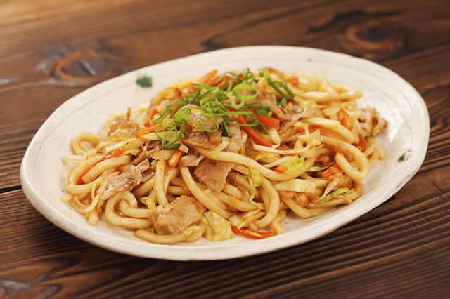 sauce yaki udon on white plate