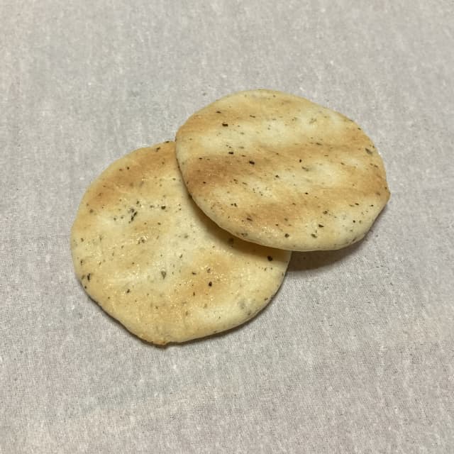 Delicious Japanese rice crackers with seasoning, traditional snack from Japan.