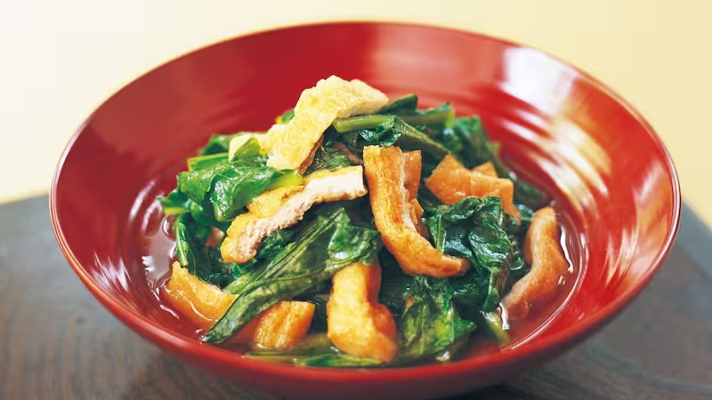 Taitan on red ceramic bowl