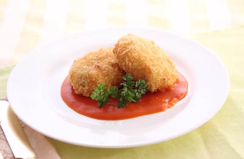 Crab cream croquette served with tomato sauce, a classic yoshoku plate