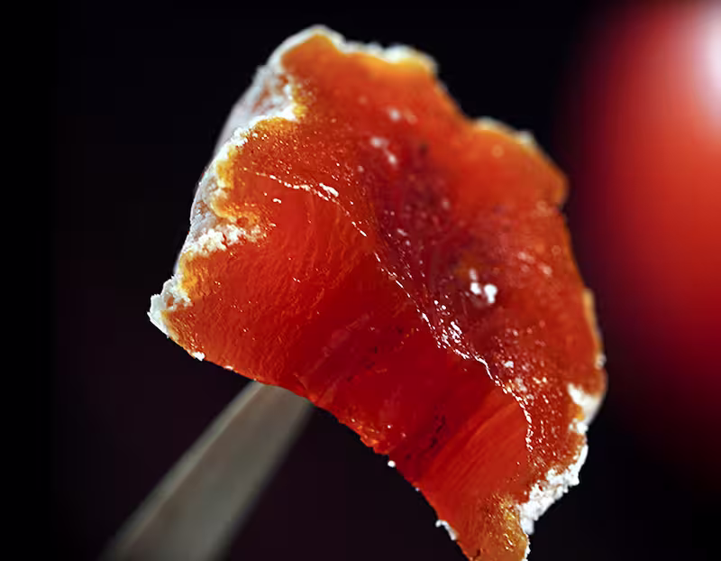 White sugar bloom on traditional koro gaki dried persimmon, cut open