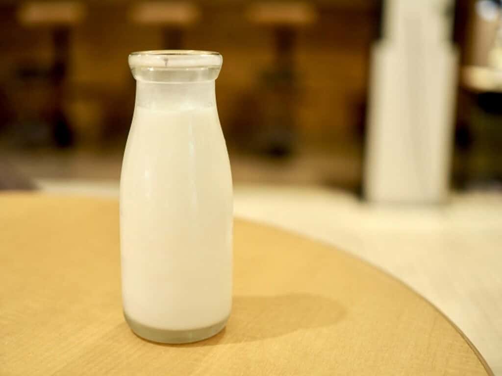Fresh Hokkaido milk in a glass bottle, creamy and pure.