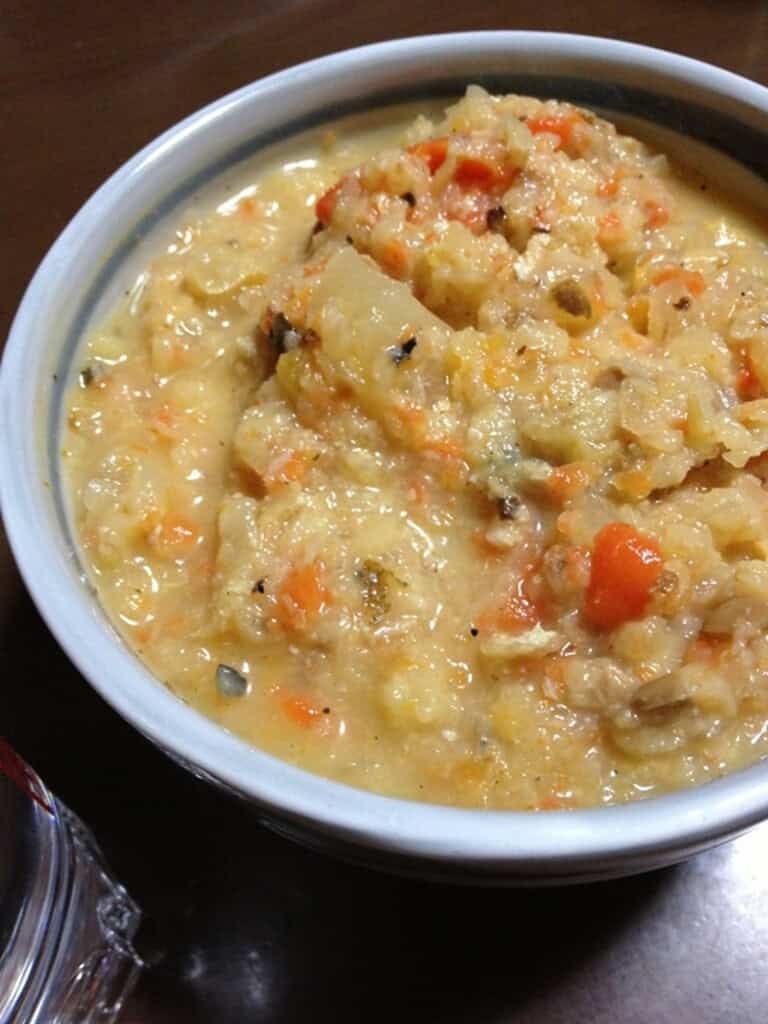 Japanese stew with vegetables and meat, served hot in a bowl.