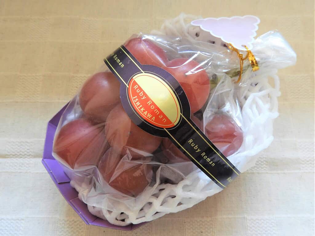 Luxurious Ruby Roman grapes, a famous Japanese delicacy known for sweetness and quality.