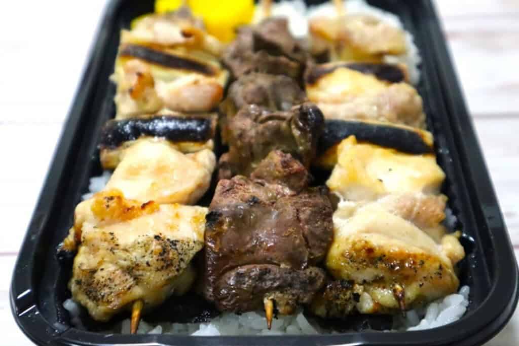 Yakitori bento with grilled chicken skewers from Hakodate, Japan.