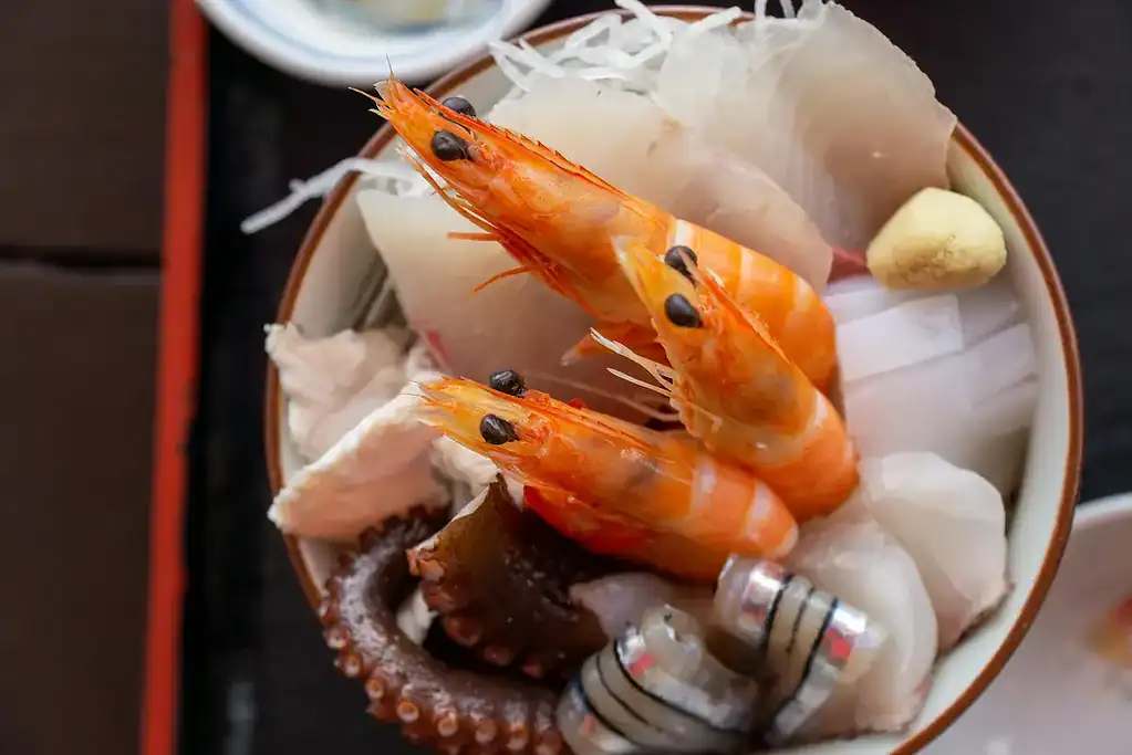 Seafood in Japan, featuring shrimp, octopus, and sashimi served fresh and beautifully presented.