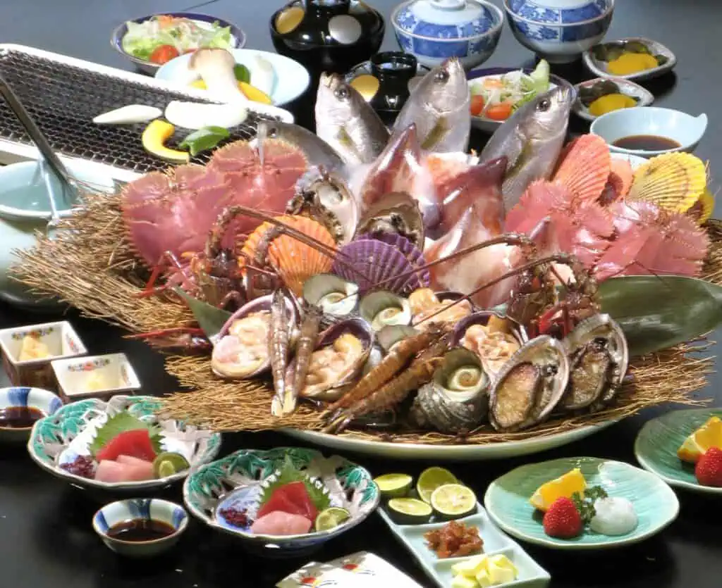 Fresh seafood platter with fish, shellfish, and sashimi for Japanese cuisine.