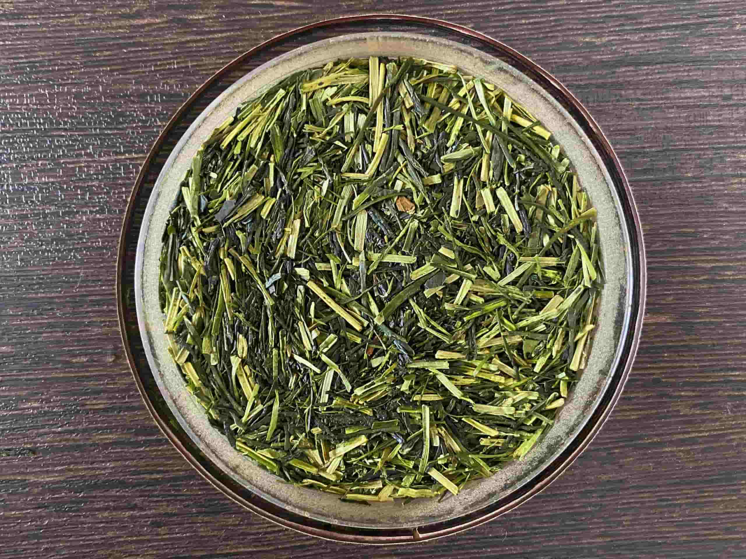 Kukicha (twig tea) leaves arranged in a bowl.